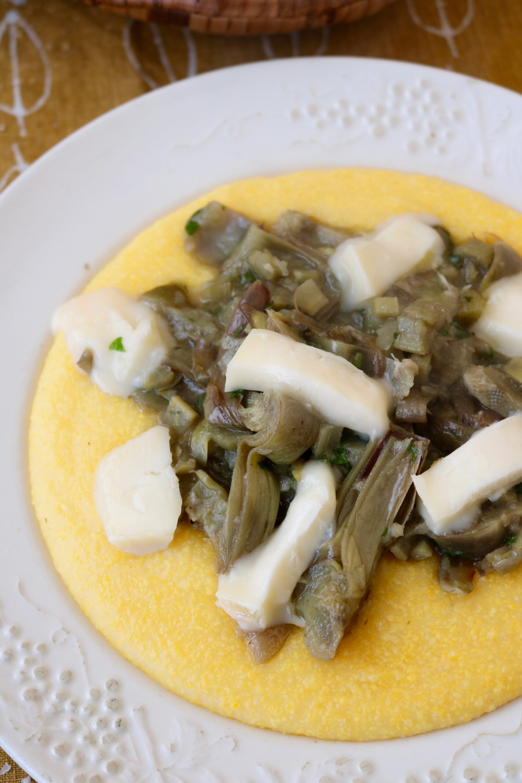 Polenta con carciofi e taleggio