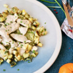 Petto di pollo con patate e cipollotti al profumo di mandarino
