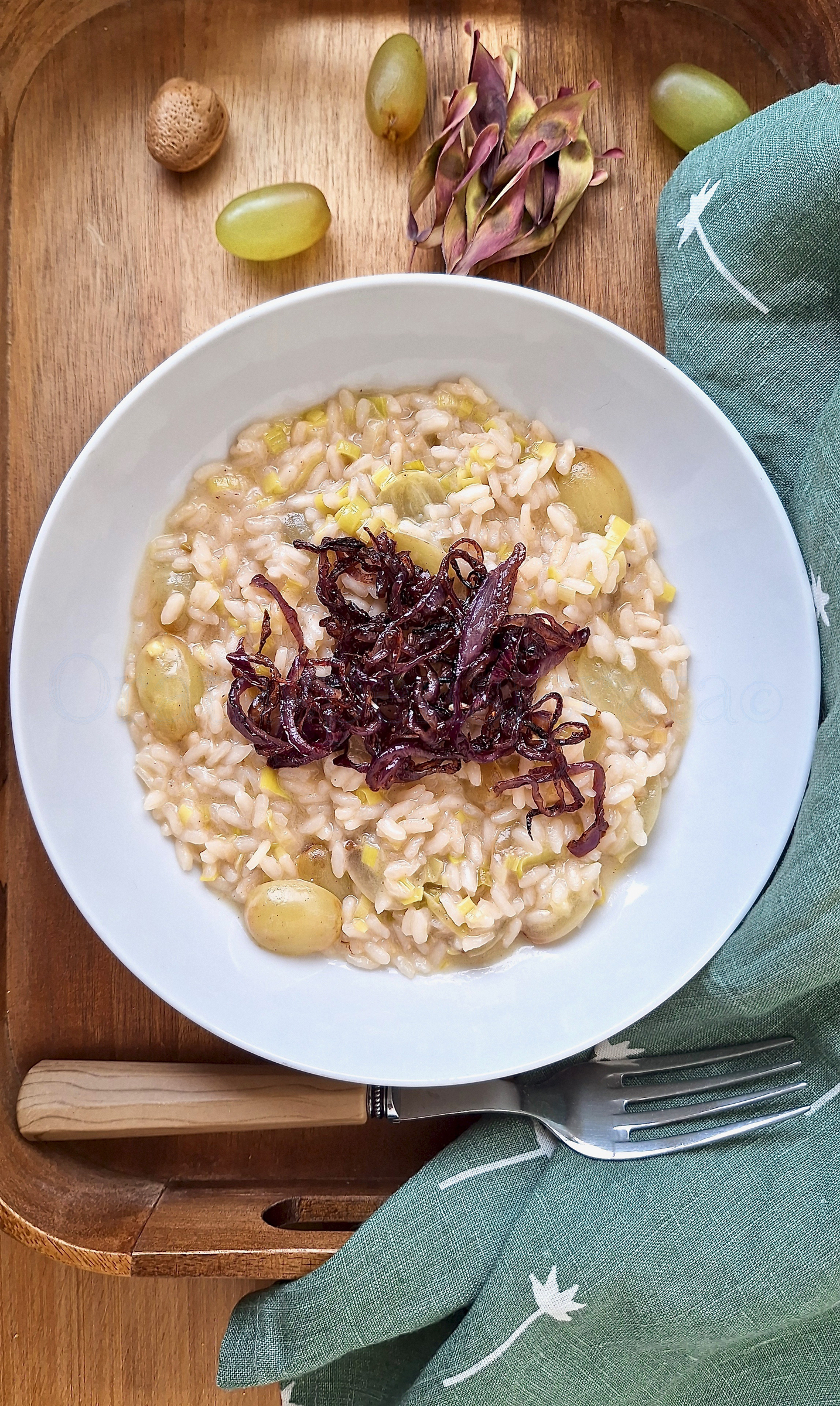 Risotto all’uva formaggio di capra cipolle caramellate